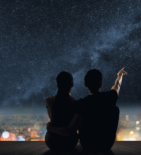 Shutterstock.com/Couple on a roof