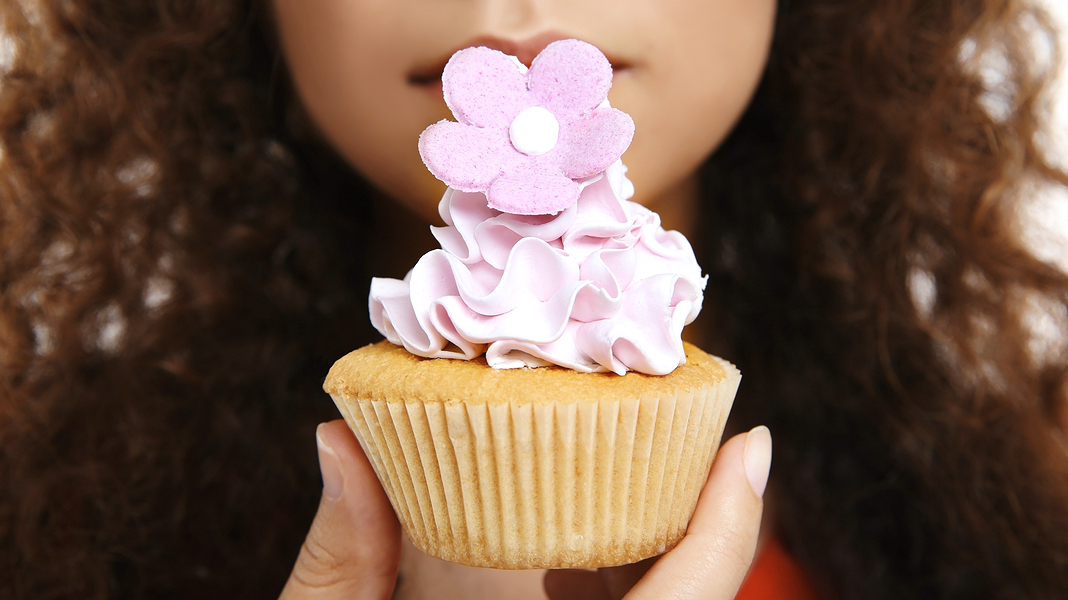 black woman eating, cupcake, sweets