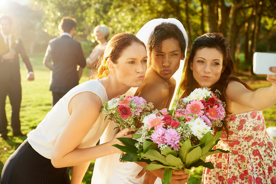 Bridesmaid and bride