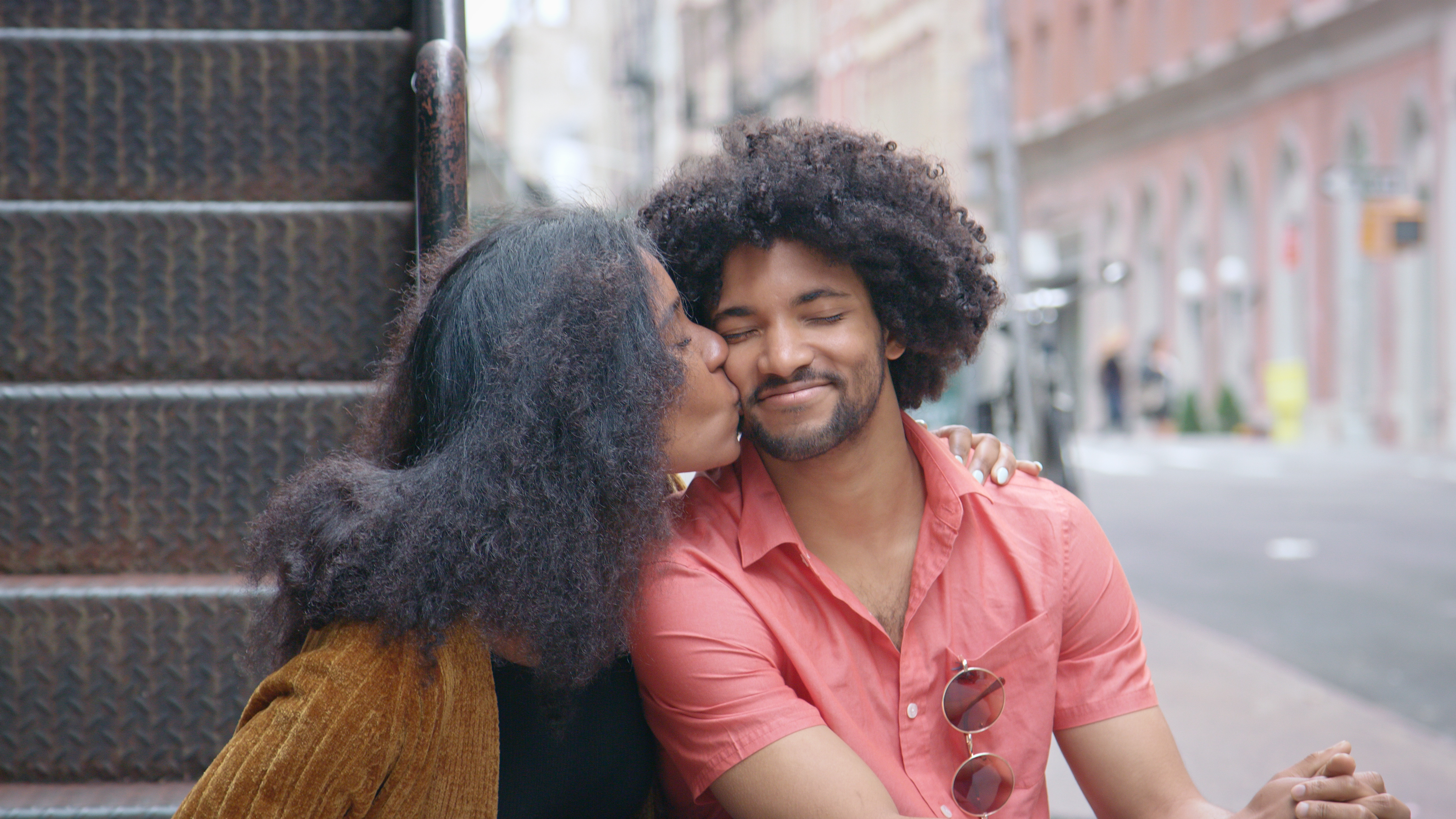 Portrait of an Attractive African American Couple Kissing in the City