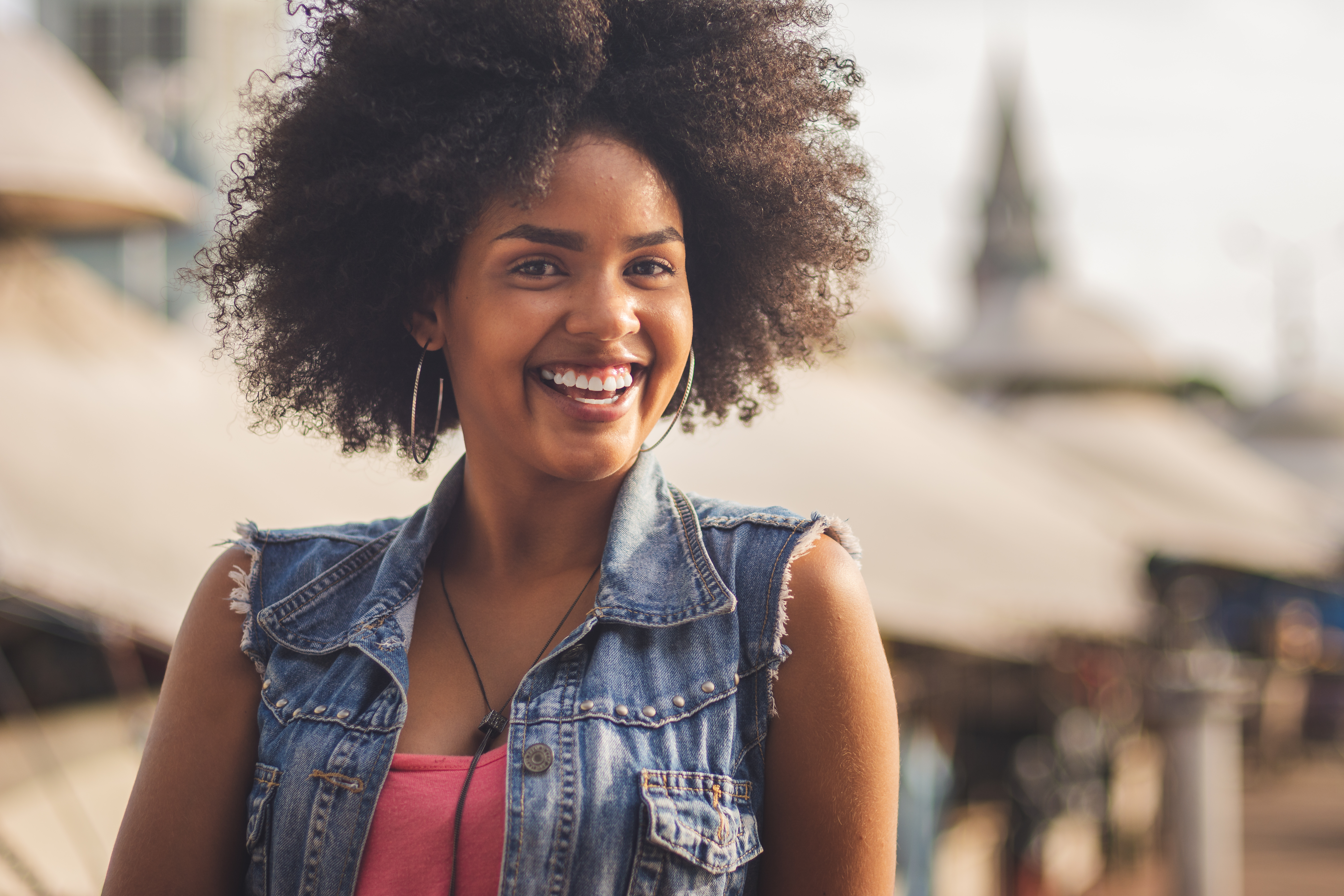 Portrait of afro brazilian woman smiling, at Ver-o-Peso Market, Belem do Para