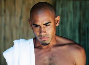 Beautiful black man relaxing at a spa