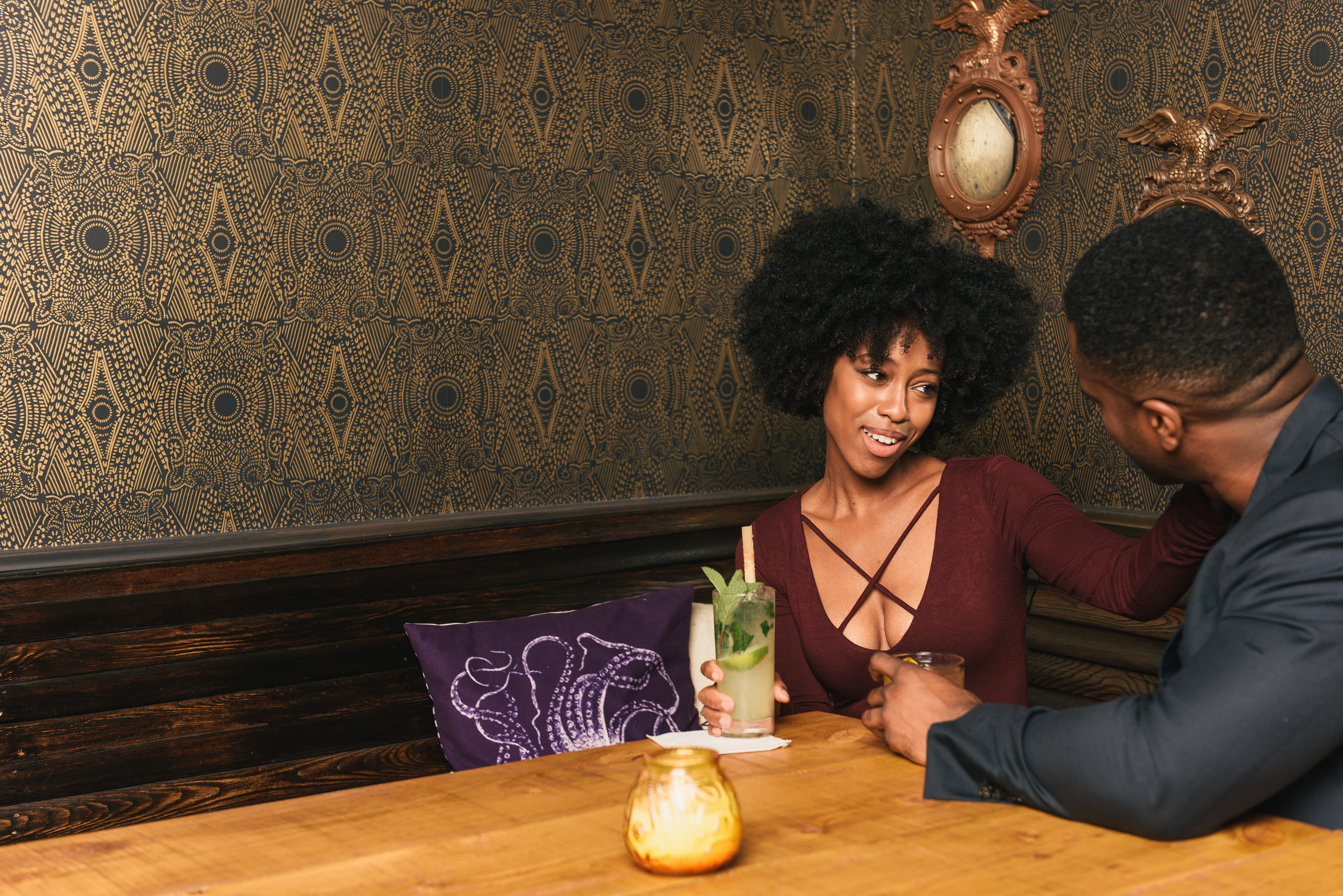 Couple sitting at table in pub