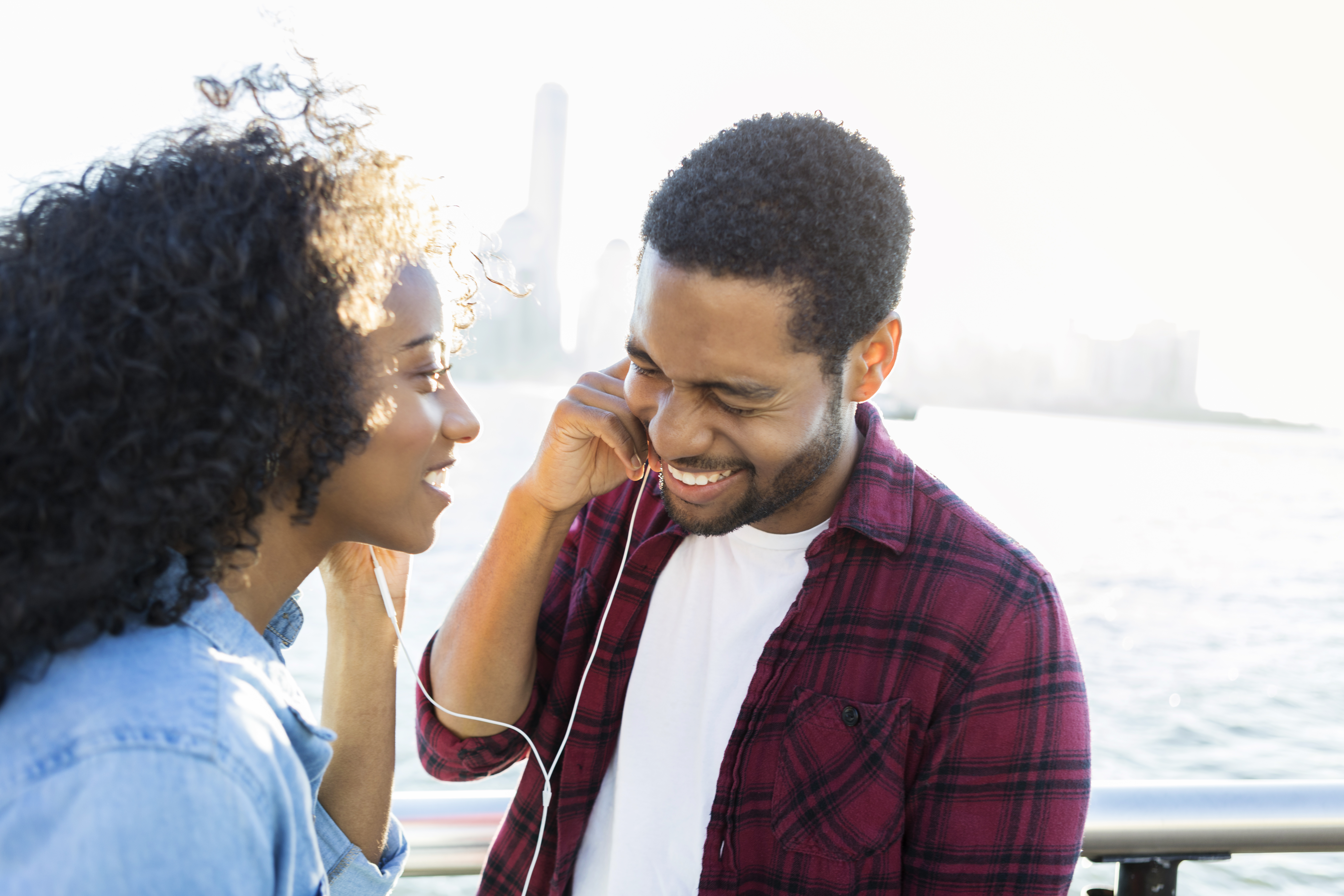 Young couple listen to music together