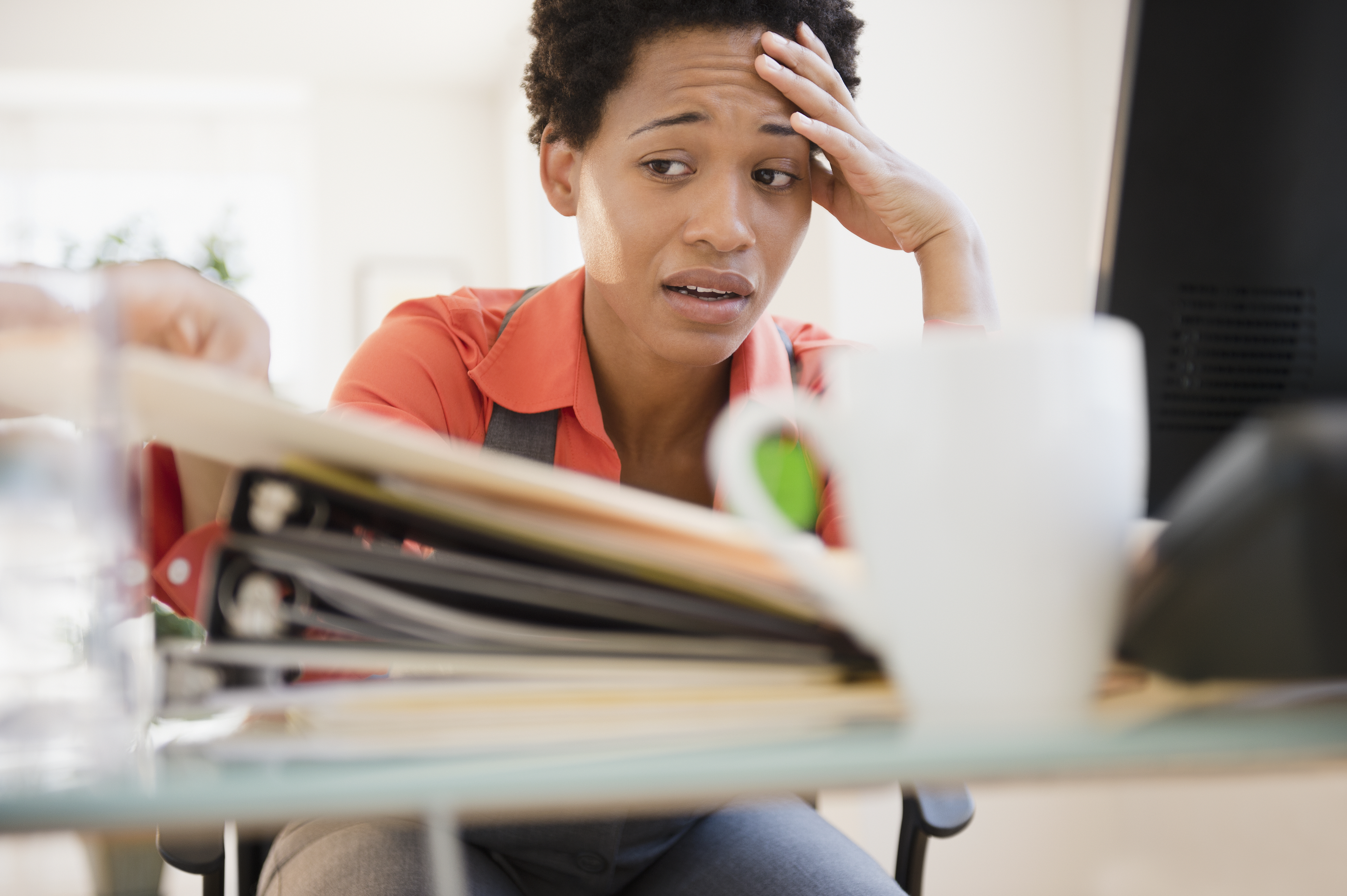 Black woman sad at work