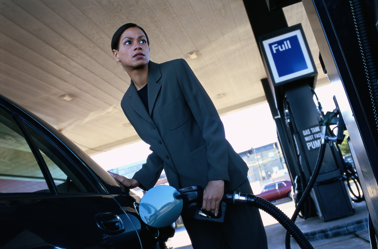 Woman at a Gas Station