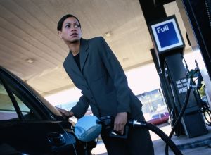 Woman at a Gas Station