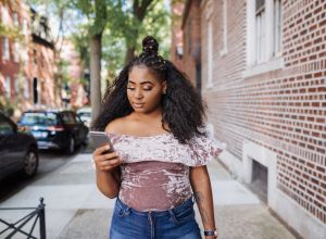 Body positive Afro-Caribbean Gen Z woman in New York