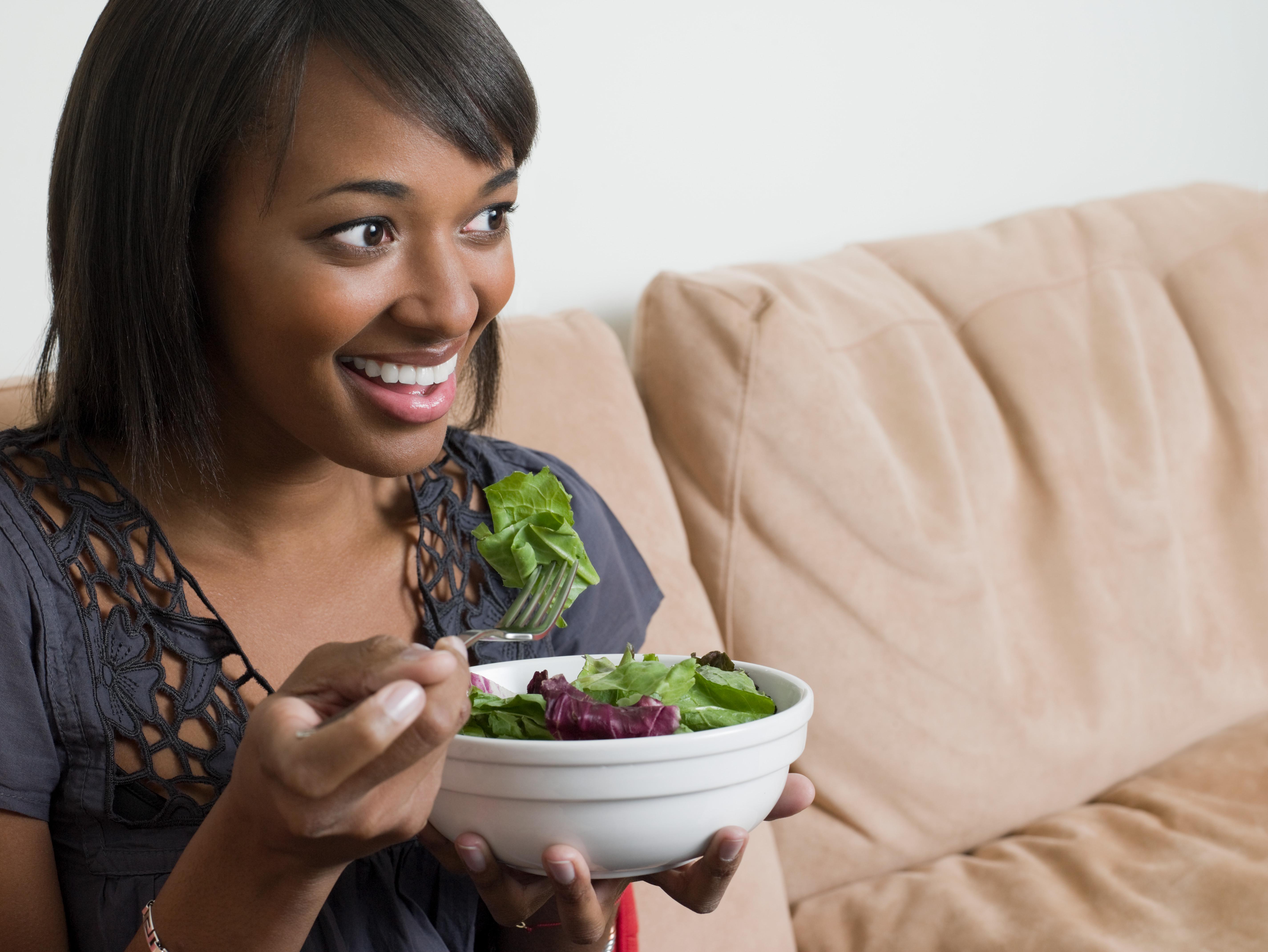 Young woman with salad