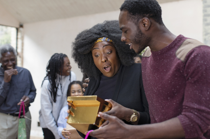 Brother surprising sister with Christmas gift