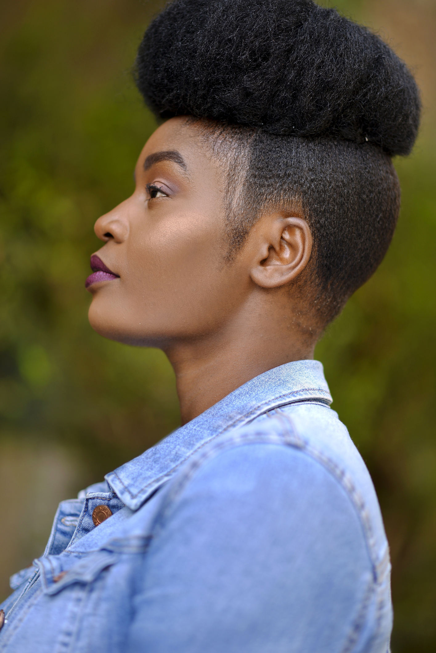 Side View Of Young Woman With Afro Hairstyle