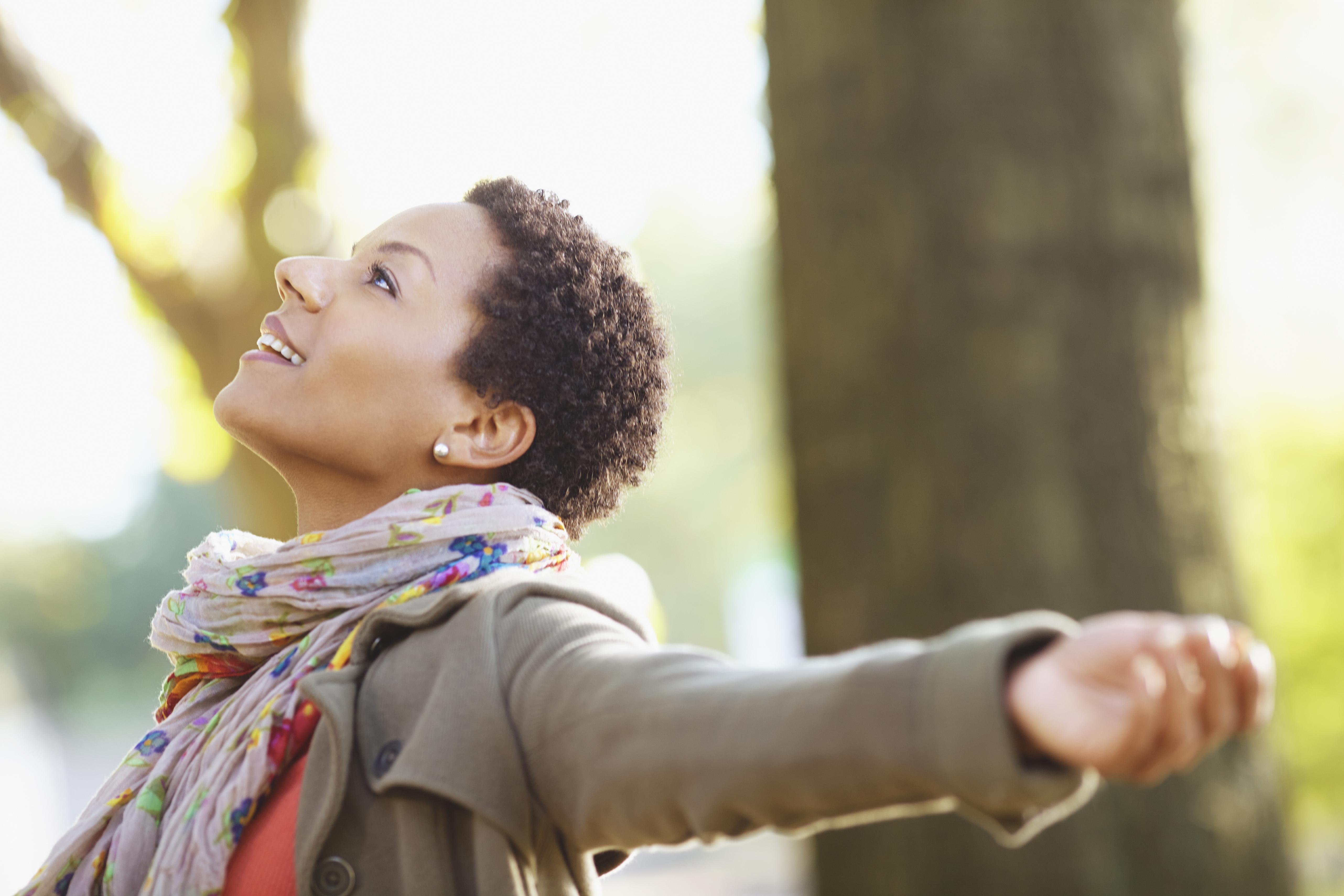 Black woman standing outdoors