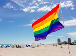 Rainbow flag on the beach in South Beach, Miami, USA