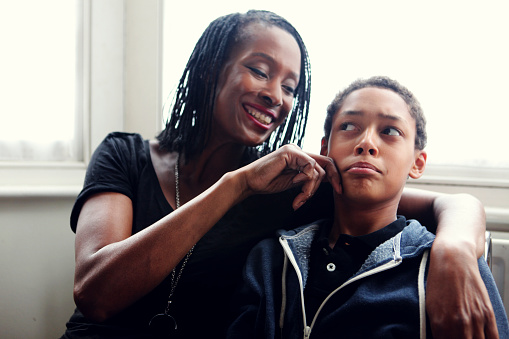 Mother and son goofing around