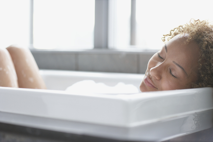 Woman taking relaxing bath