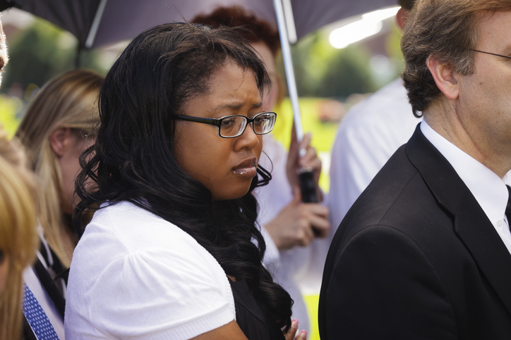 Woman at a Funeral