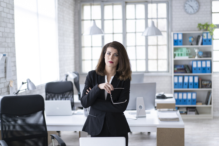 Businesswoman standing in modern office