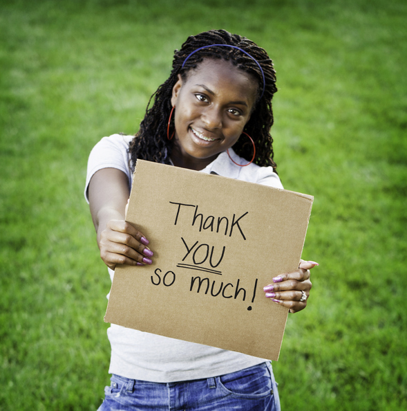 Teen Girl with Thank You Sign
