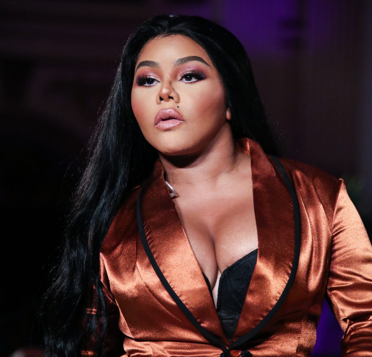 Rapper Lil' Kim performs onstage at the PrettyLittleThing x Saweetie runway show during New York Fashion Week: The Shows held at The Plaza Hotel on September 8, 2019 in Manhattan, New York City, New York, United States.