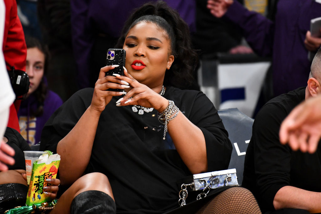 Lizzo Bares All at a Laker's Game While Her Song Plays