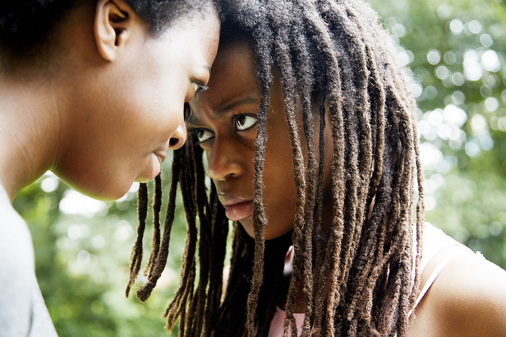 Two teenage girls in conflict