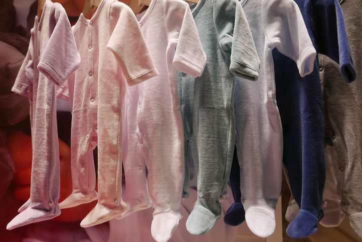 Baby Clothes Hanging At Shop