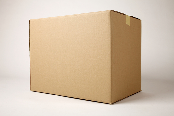 Close-Up Of Brown Cardboard Box Against White Background