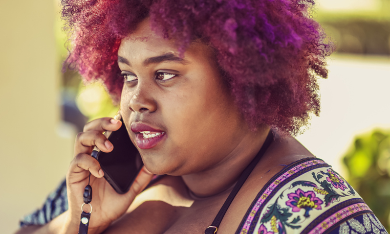 Unique woman talking on a cell phone