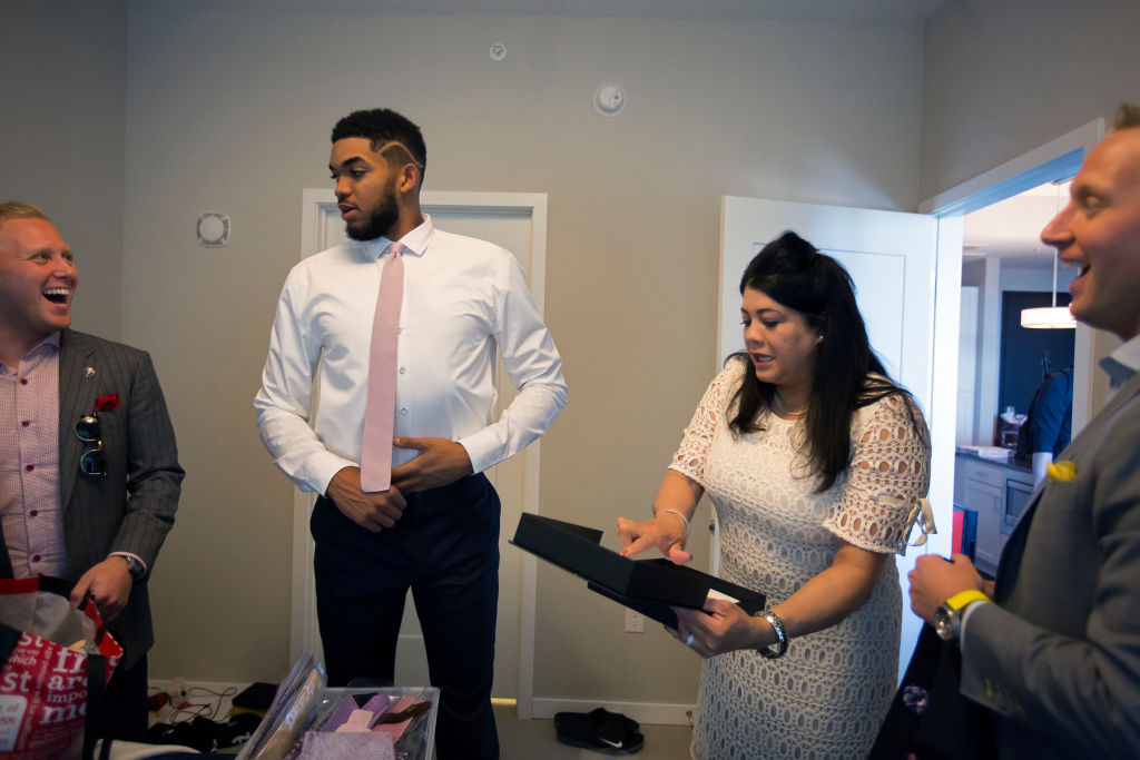 Timberwolves player Karl Anthony Towns with his family before being named rookie of the year,