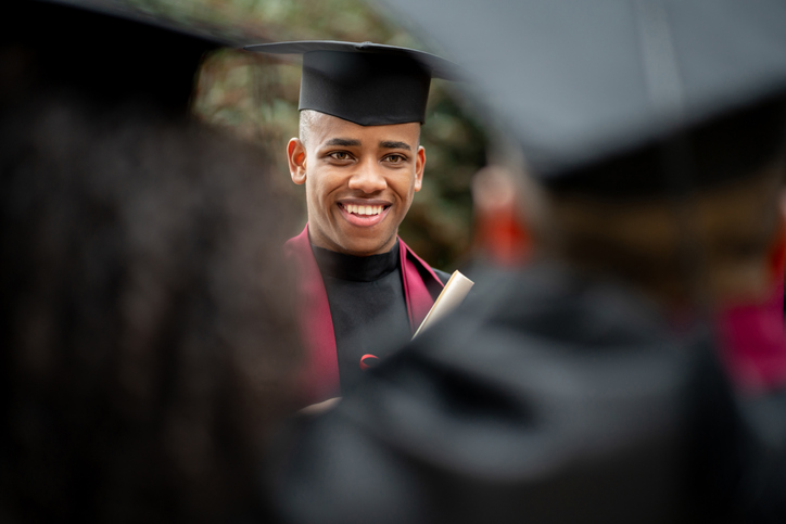 African American student looking happy on his graduation day
