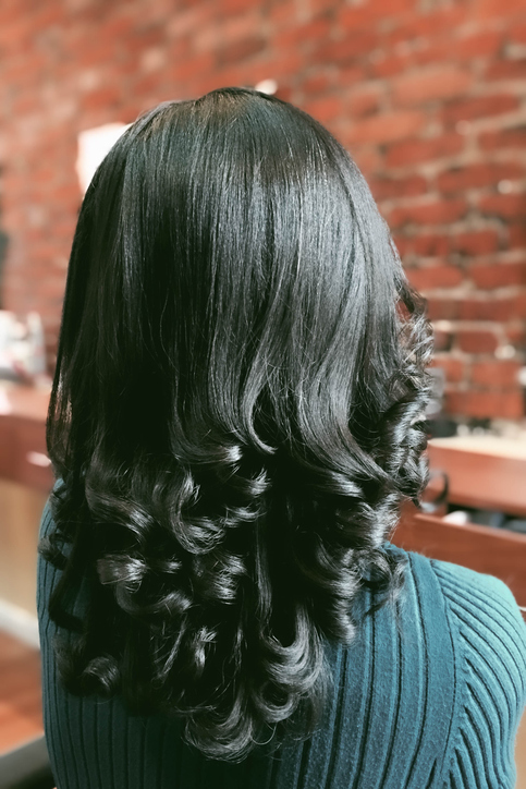 Back of Head of Black Woman with Relaxed Hair