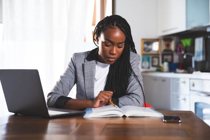Woman learning and teaching homeschooling in video conference