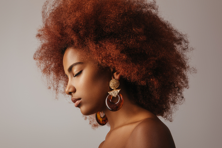 Beautiful afro girl with earrings