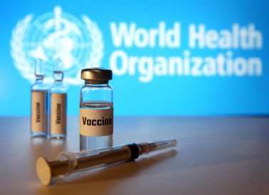 In this photo illustration, vials of fake 'Covid-19 Vaccine...