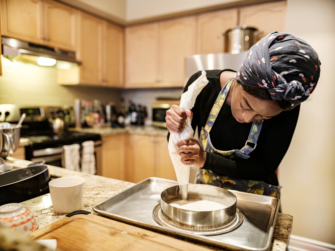 Young woman baking