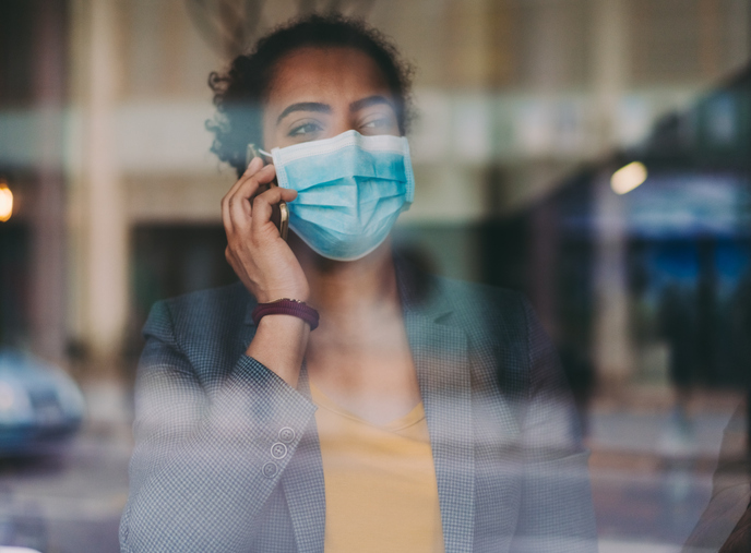 Portrait of businesswoman wearing protective face mask, COVID-19 pandemic