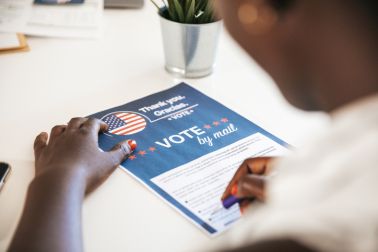 Woman voting from home for the USA Election