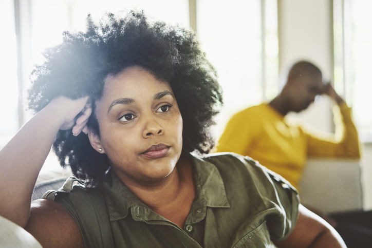 Woman looking upset after an argument with her husband