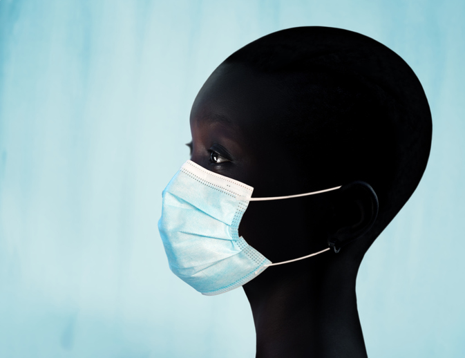 Black woman wearing protection mask