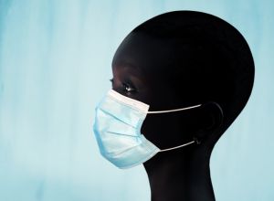 Black woman wearing protection mask