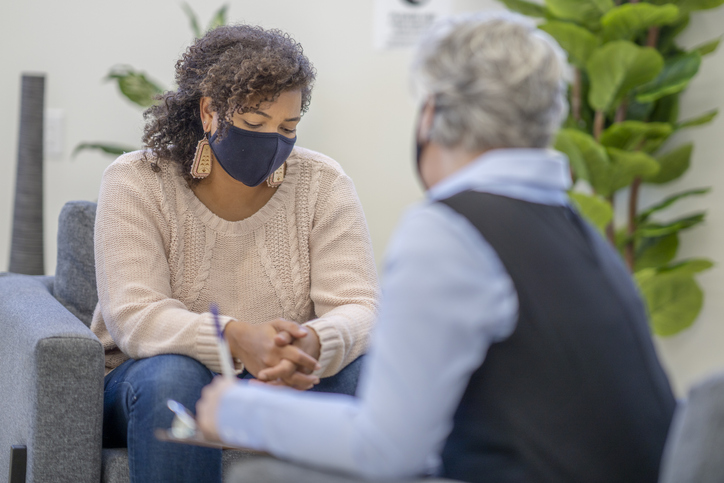 Patient wearing a mask during therapy session