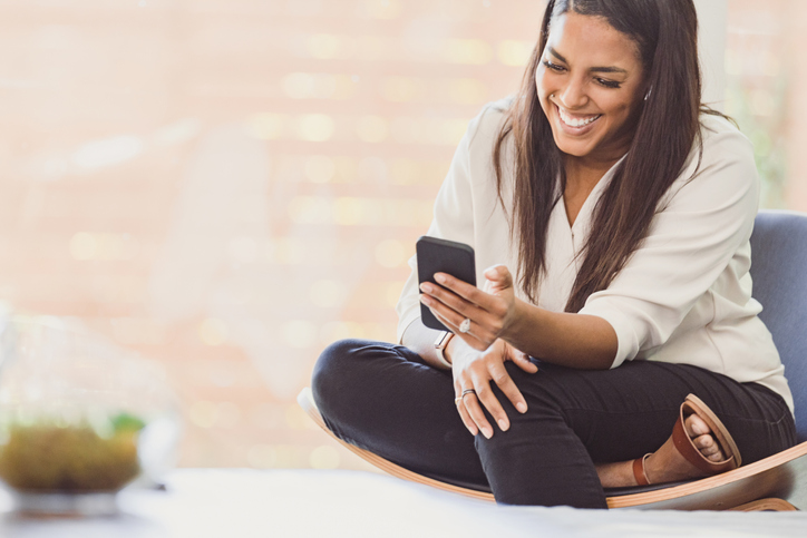 Mom takes break to surf social media on phone