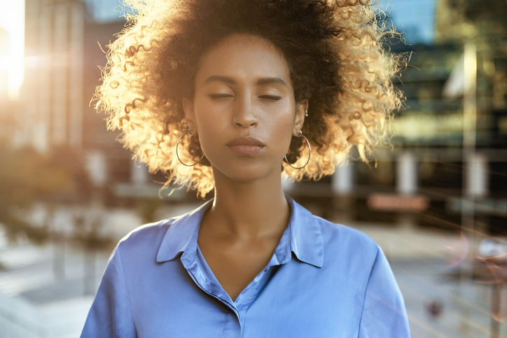 Portrait of beautiful business woman in sunset