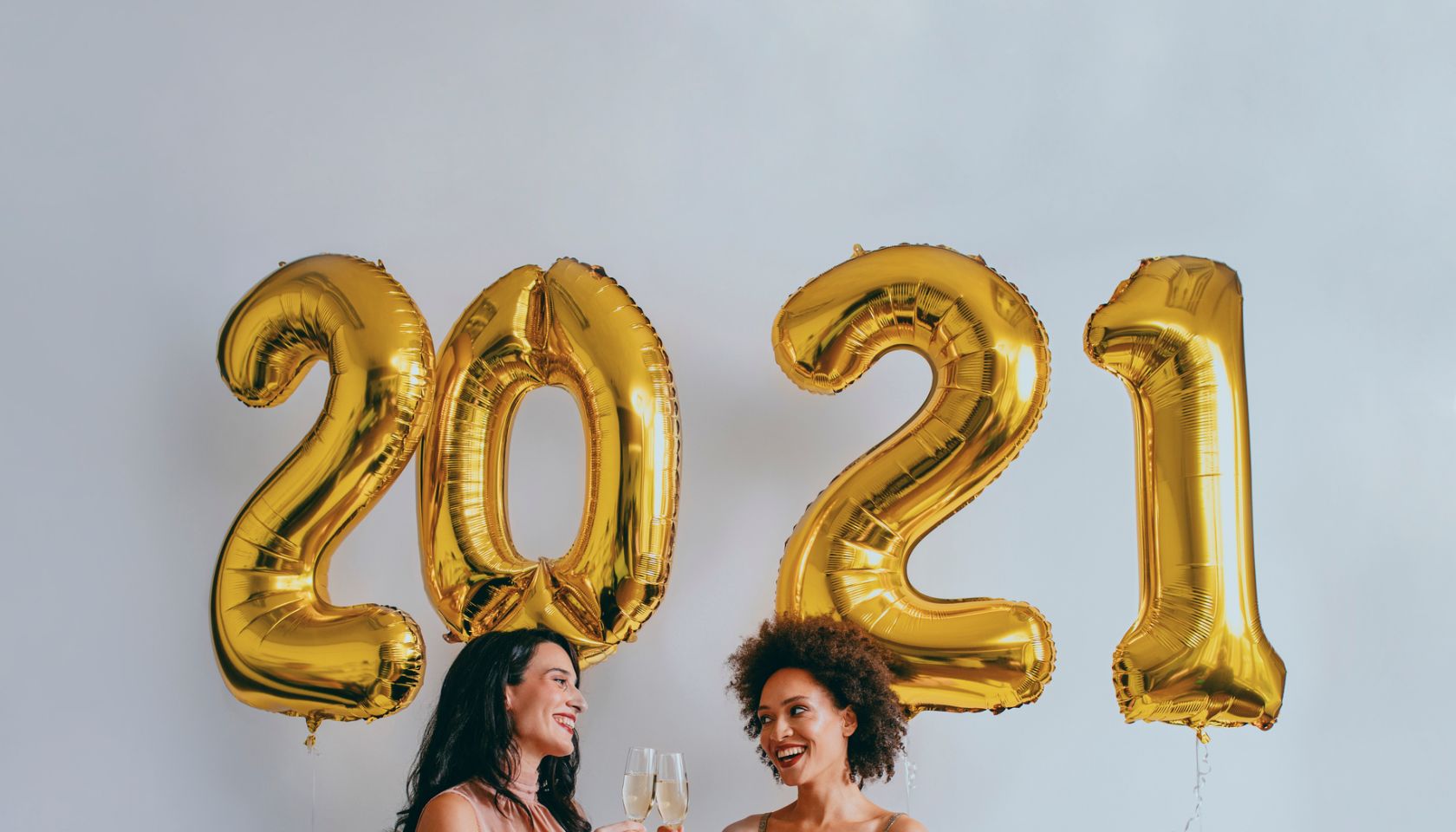 Happy New Year: Two Happy Woman Drinking Chapagne to Celebrate Together