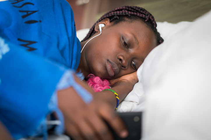 Healthy serene african girl sleeping in comfortable bed