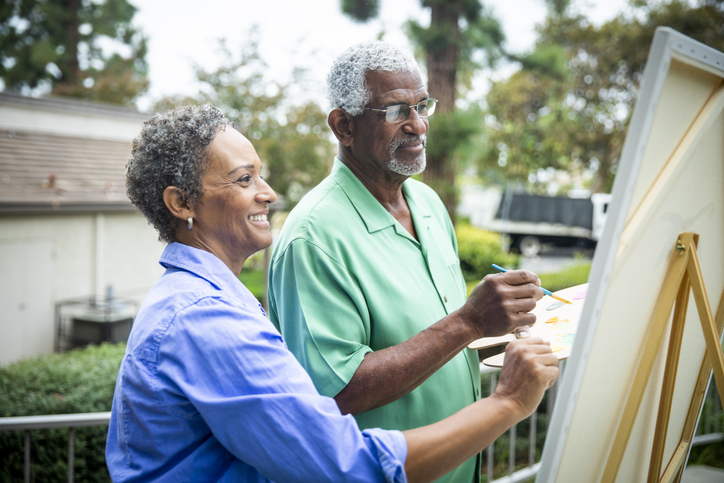 Senior Black Couple Painting on Canvas