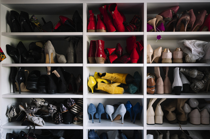 Variation of footwear in rack at home