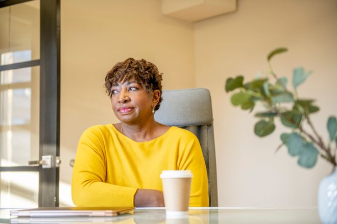 Beautiful senior woman in an office