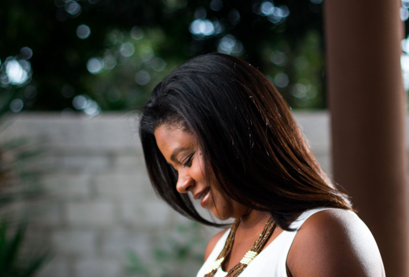 Side View Of Pregnant Woman Standing Outdoors