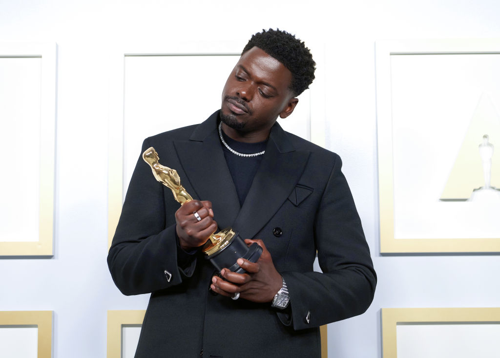 Daniel Kaluuya poses with his Oscar award at the 93rd Annual Academy Awards.